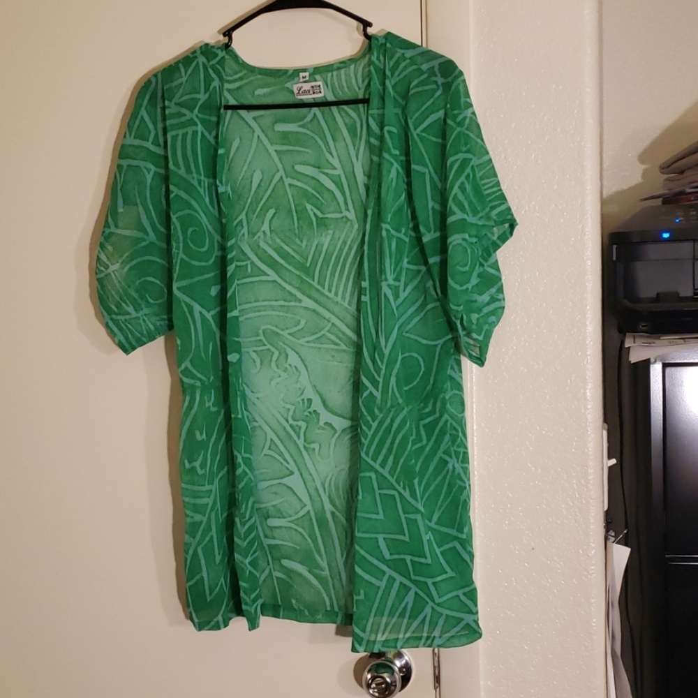 Sheer top, possibly to use as a cover up.
